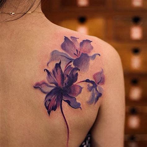 flores tattoo|pretty flower tattoos for women.